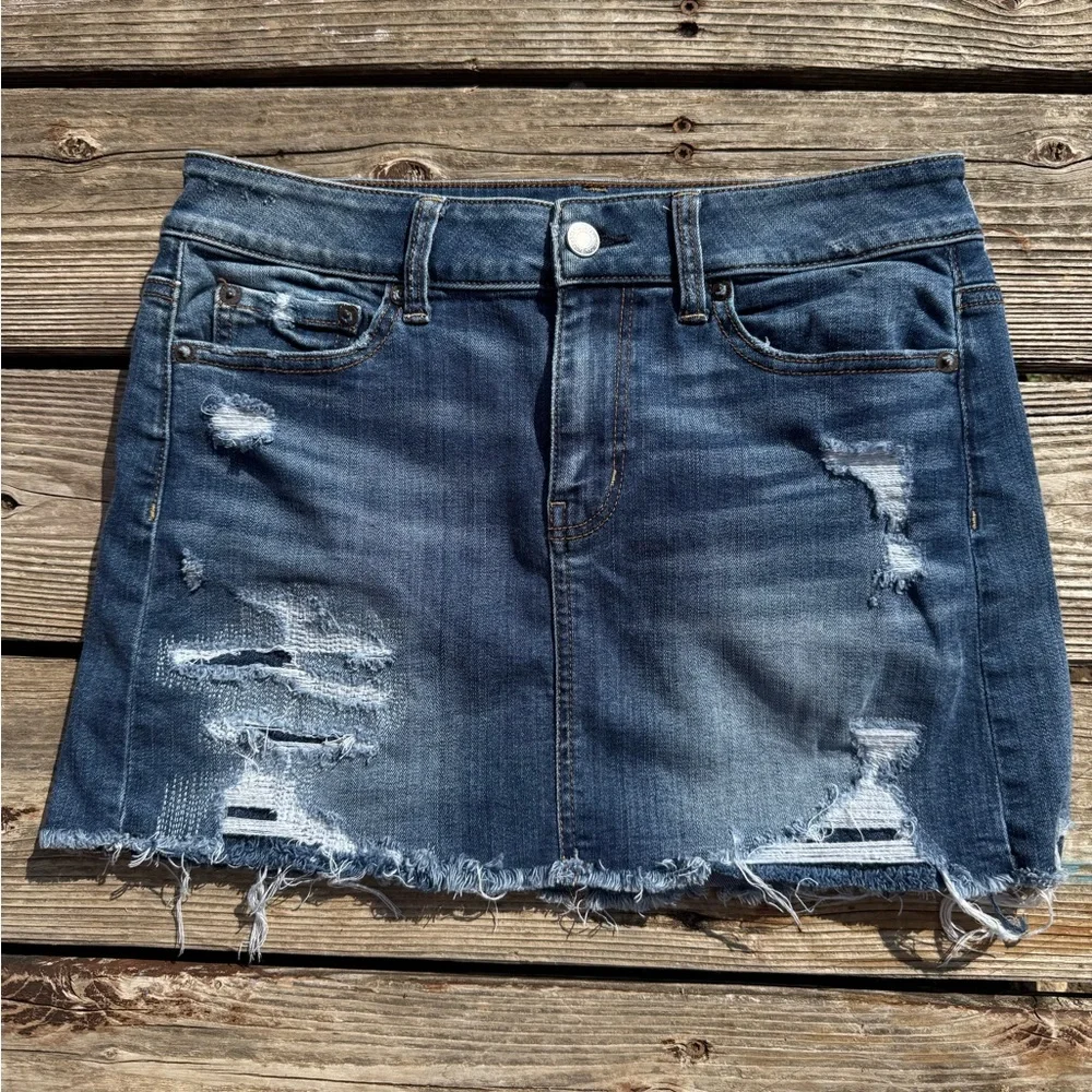 American Eagle Outfitters Distressed Dark Blue Denim Mini Skirt Size 4 - Picture 1 of 6